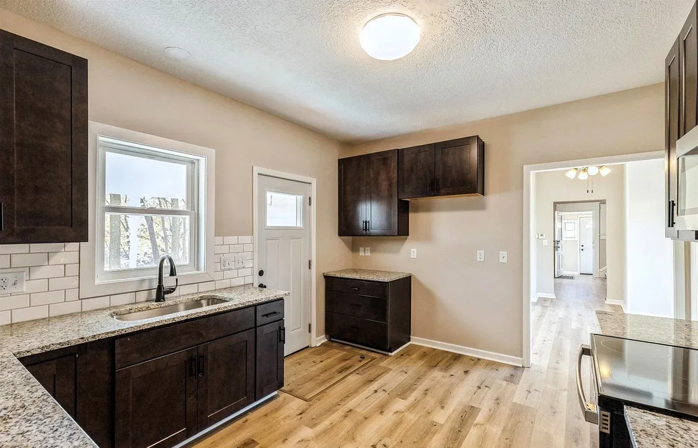 Kitchen remodel with granite counters in Davenport, Iowa